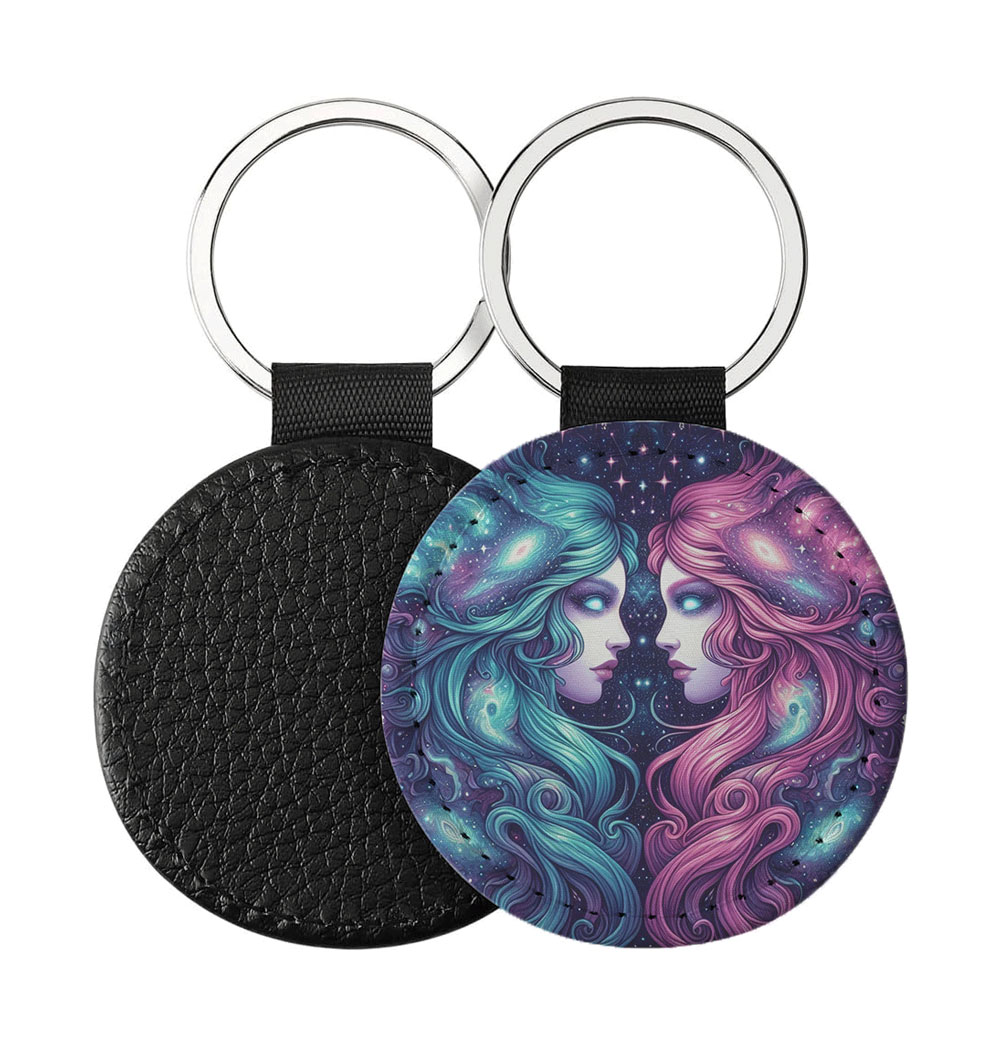Portachiavi Rotondo CP-0015 in pelle PU con grafica astrologica del segno dei Gemelli galattico nei toni del turchese e viola, retro nero in pelle e anello in acciaio