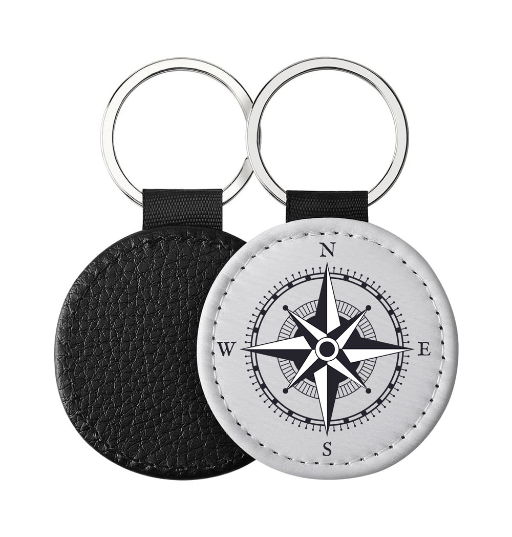Portachiavi Rotondo CP-0002 in pelle PU con illustrazione di una rosa dei venti in bianco e nero con punti cardinali, retro nero in pelle e anello in acciaio