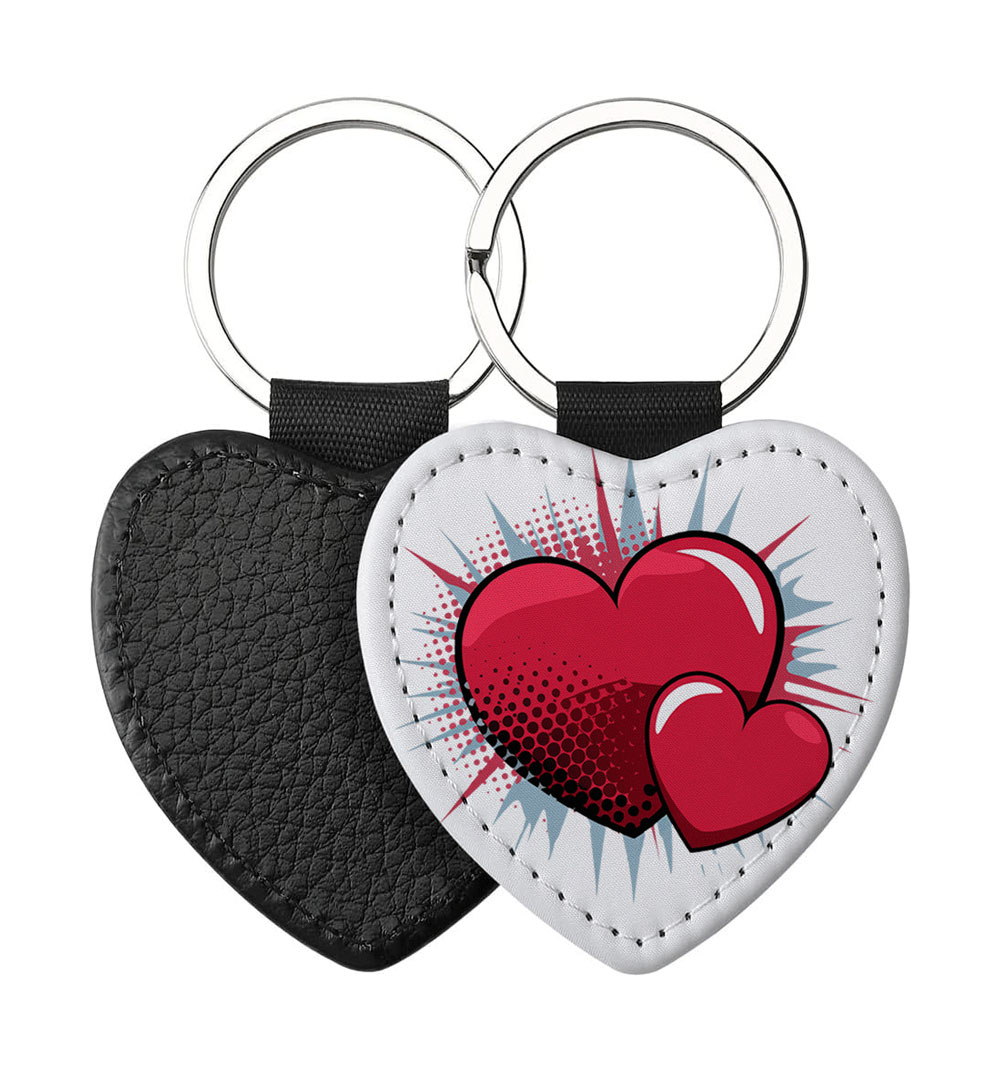 Portachiavi a forma di Cuore CP-0021 in pelle PU con grafica pop art a fumetto con due cuori rossi ed esplosione di raggi azzurri, retro nero in pelle e anello in acciaio