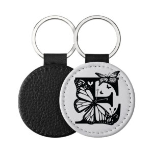 Portachiavi Rotondo CP-0025 in pelle PU con grafica in bianco e nero con lettera iniziale E e farfalle, retro nero in pelle e anello in acciaio