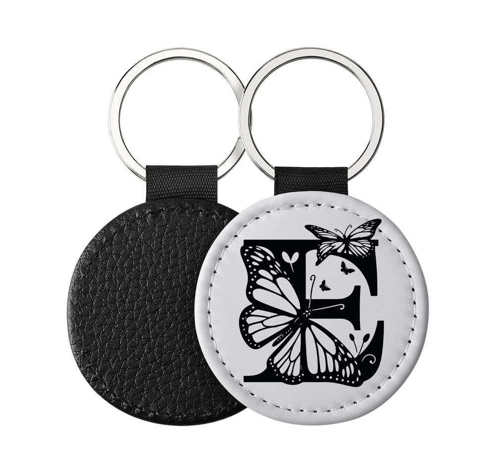 Portachiavi Rotondo CP-0025 in pelle PU con grafica in bianco e nero con lettera iniziale E e farfalle, retro nero in pelle e anello in acciaio