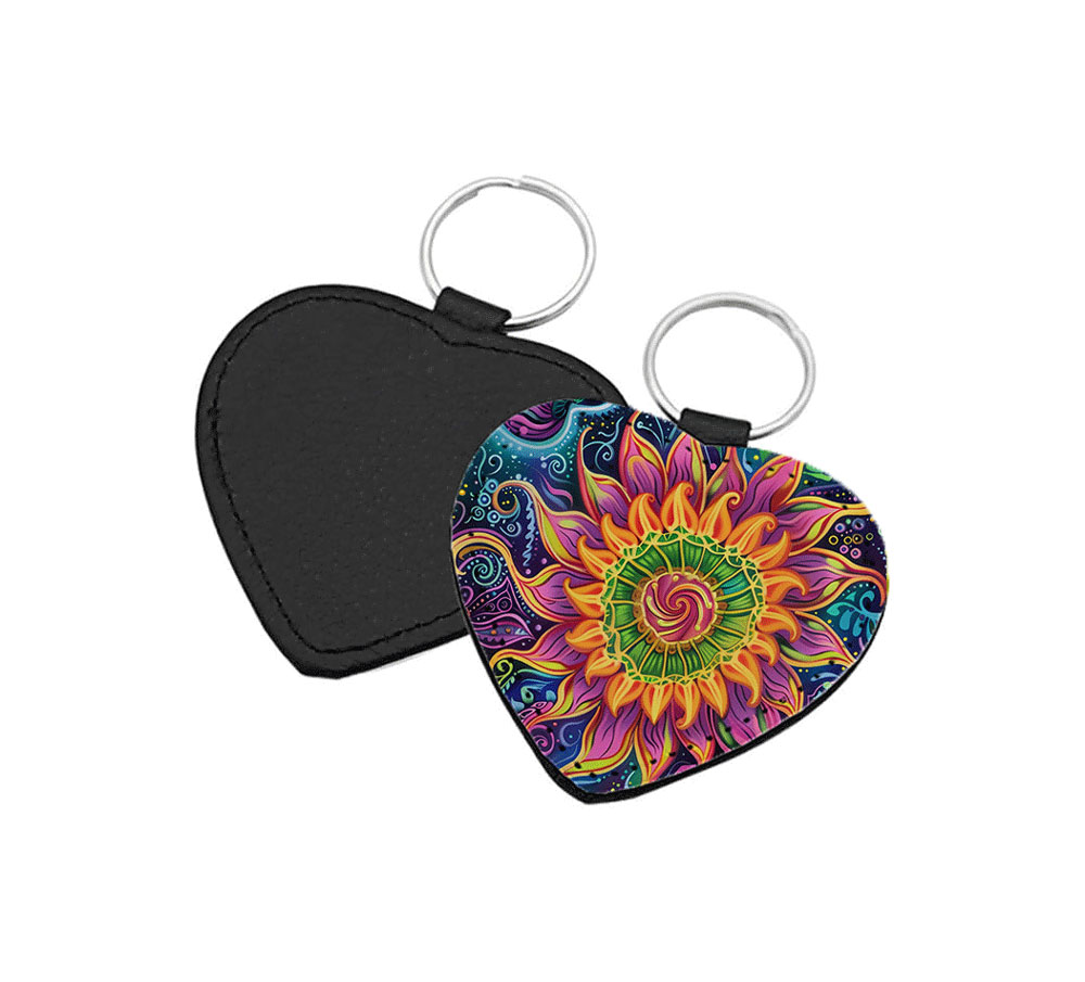 Portachiavi a forma di Cuore CP-0026 in pelle PU con grafica a fiore e sole psichedelico mandala nei toni del giallo, viola e blu, retro nero in pelle e anello in acciaio